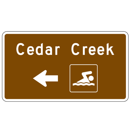 A brown rectangular sign with white lettering reads Cedar Creek. A white arrow points left beside a white swimming symbol.