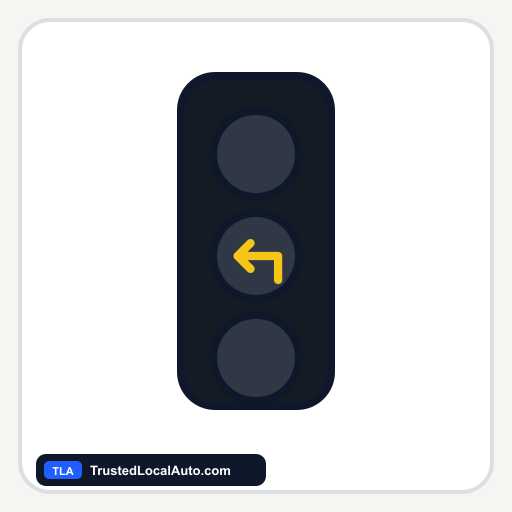 A yellow left-turn arrow lit within a dark traffic-signal lens. The other two lamps are unlit.