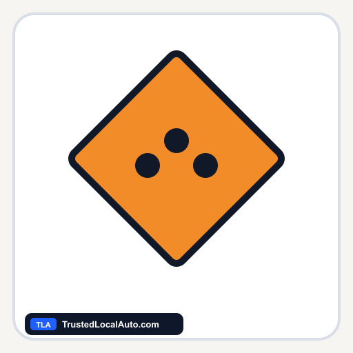 A plain orange diamond sign in the shape and colour of a construction warning sign.