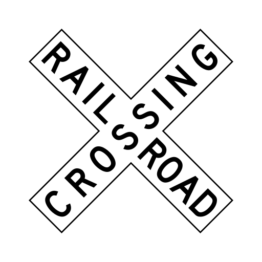 White X-shaped crossbuck with black RAILROAD CROSSING lettering.