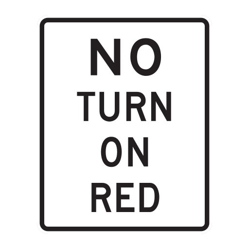 The upright white sign reads NO TURN ON RED in black words, with no time or day restriction.