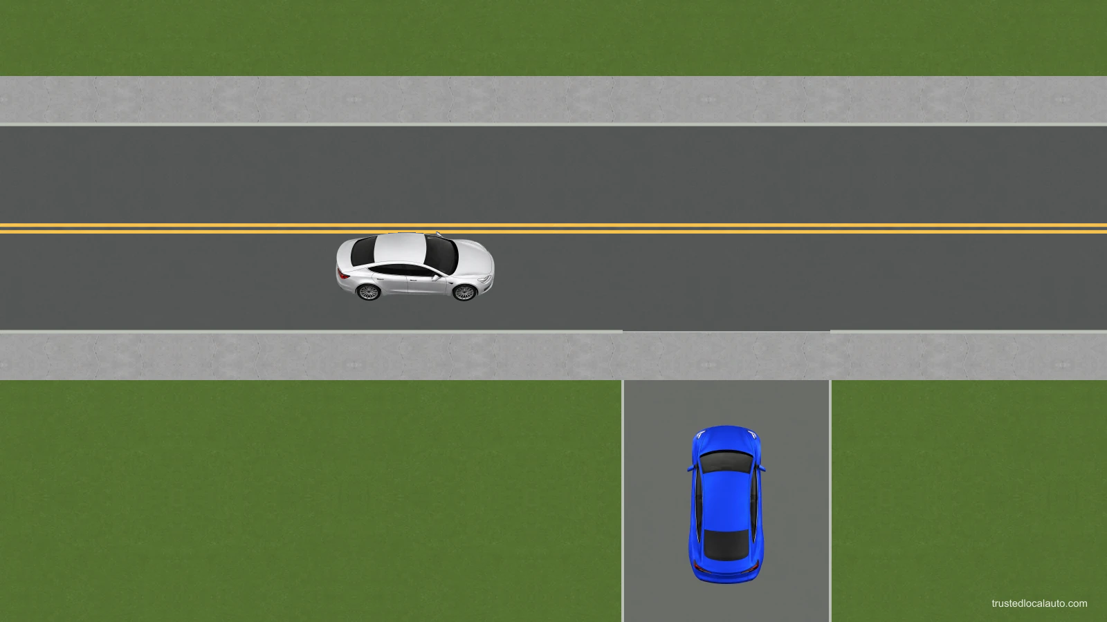 An alley ends at a sidewalk below the street. The northbound blue car is in that alley and a silver car uses the street. No badge or action overlay is shown.