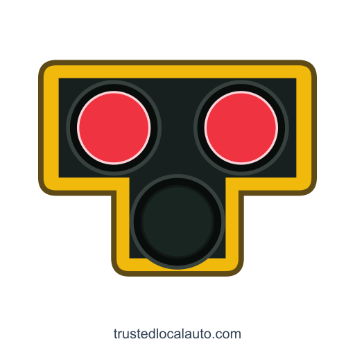 Front view of a pedestrian hybrid beacon with both upper red lenses steadily illuminated and the single lower yellow lens dark.