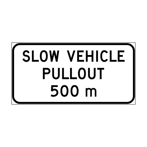 White rectangular sign reading SLOW VEHICLE PULLOUT 500 m.