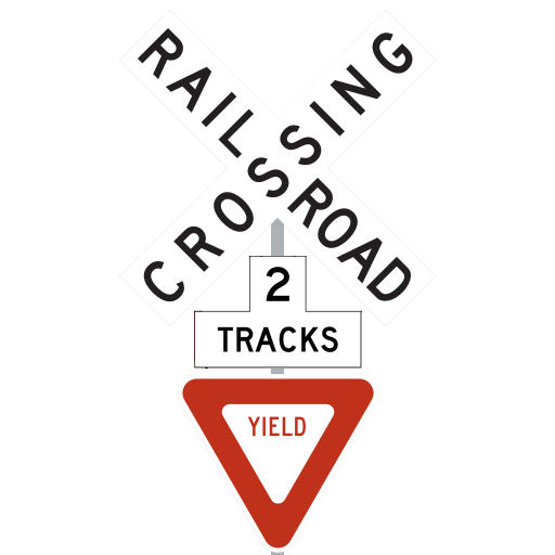 A post carries a white RAILROAD CROSSING crossbuck, a white 2 TRACKS plaque and a red-and-white YIELD sign. No warning lights or gate are attached.