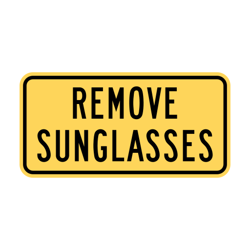 B.C. road sign W-030-TD displaying Remove sunglasses.