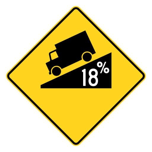 A yellow diamond with a black border shows a black truck on a sloping black wedge. White 18% appears inside the wedge.