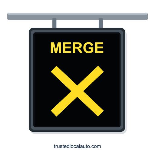 A black electronic panel hangs from an overhead support. It displays the yellow word MERGE above a yellow X.