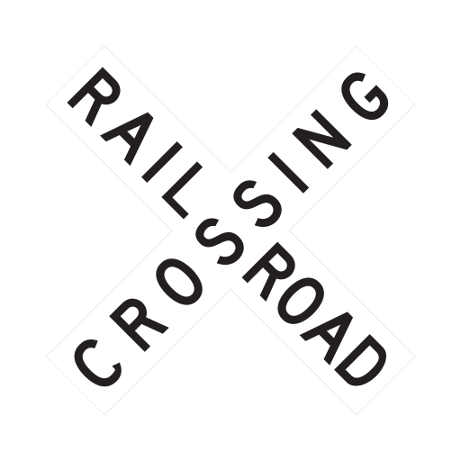 Two white boards form an X and spell RAILROAD CROSSING in black letters.